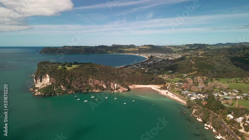 Flying around limestone clifftops of Cooks Bay photo