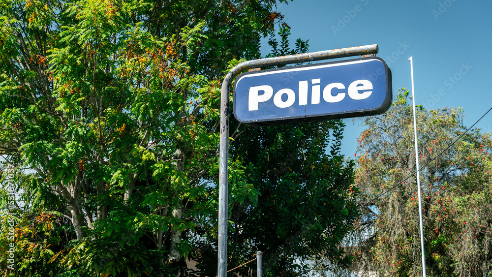 Fototapeta premium Old peeling blue Police sign