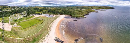 Aerial of the mouth of the Fintragh river at Fintra beach by Killybegs, County Donegal, Ireland photo