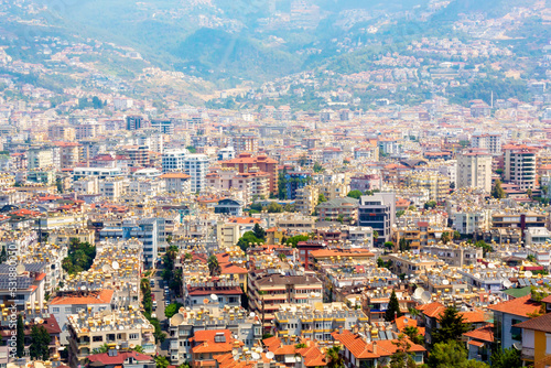 Fototapeta Naklejka Na Ścianę i Meble -  Panorama of Alanya city, Turkey (Turkiye). Modern landscape. A view from above citadel (the Ich Kale fortress). Beautiful cityscape of pupular Turkish resort.