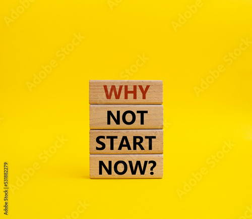 Why not start now symbol. Concept words Why not start now on wooden blocks. Beautiful yellow background. Business and Why not start now concept. Copy space.