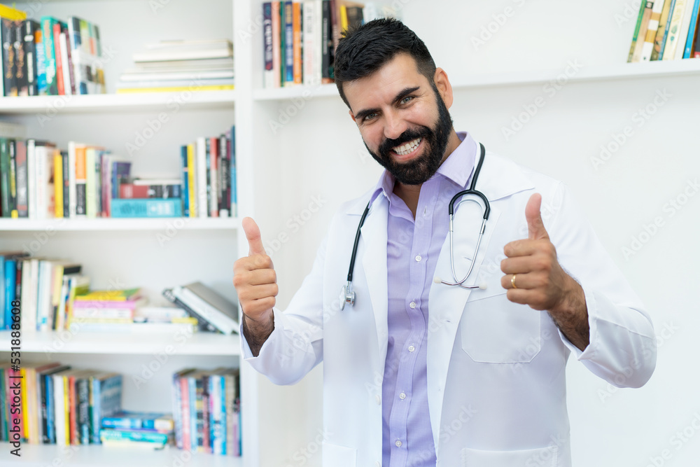Optimistic hispanic mature doctor with beard Optimistic hispanic mature doctor with beard