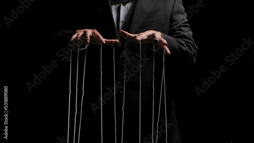 Canvastavla Man hands with strings on fingers on black background