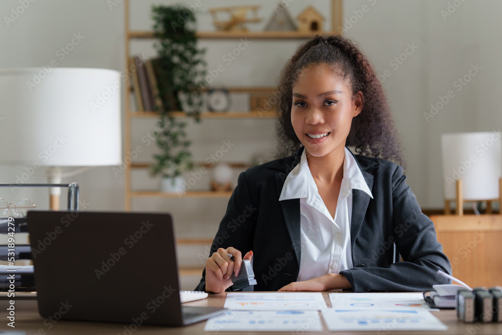 Asian Business woman working to analyze technical price graph and indicator. finance concept Asian Business woman working to analyze technical price graph and indicator. finance concept