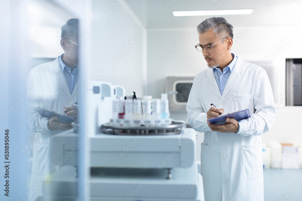 Researcher working in laboratory Researcher working in laboratory