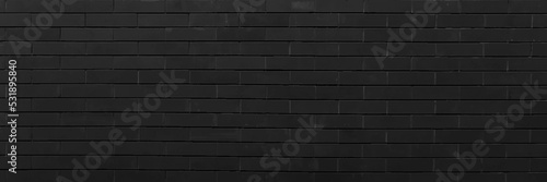 Black brick wall for background.