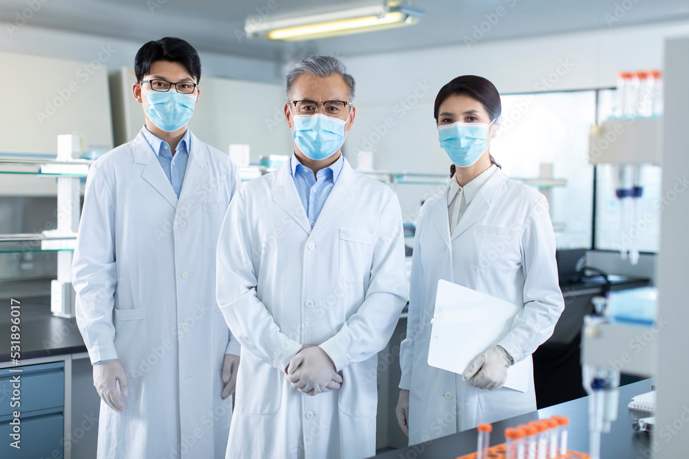 Portrait of research team in laboratory Portrait of research team in laboratory