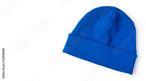 Electric blue beanie hat made from natural eco-fabric in ribbed. Isolation on a white background. Copy space