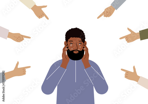 The concept of public condemnation, victim blaming and bullying. Crying depressed man. The fingers point at the character and hate him. Internet cyberbullying.