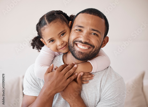 Children, family and love with a girl and her father hugging, embracing and bonding together in their home. Kids, smile and happy with a man and his daughter enjoying time with a loving expression