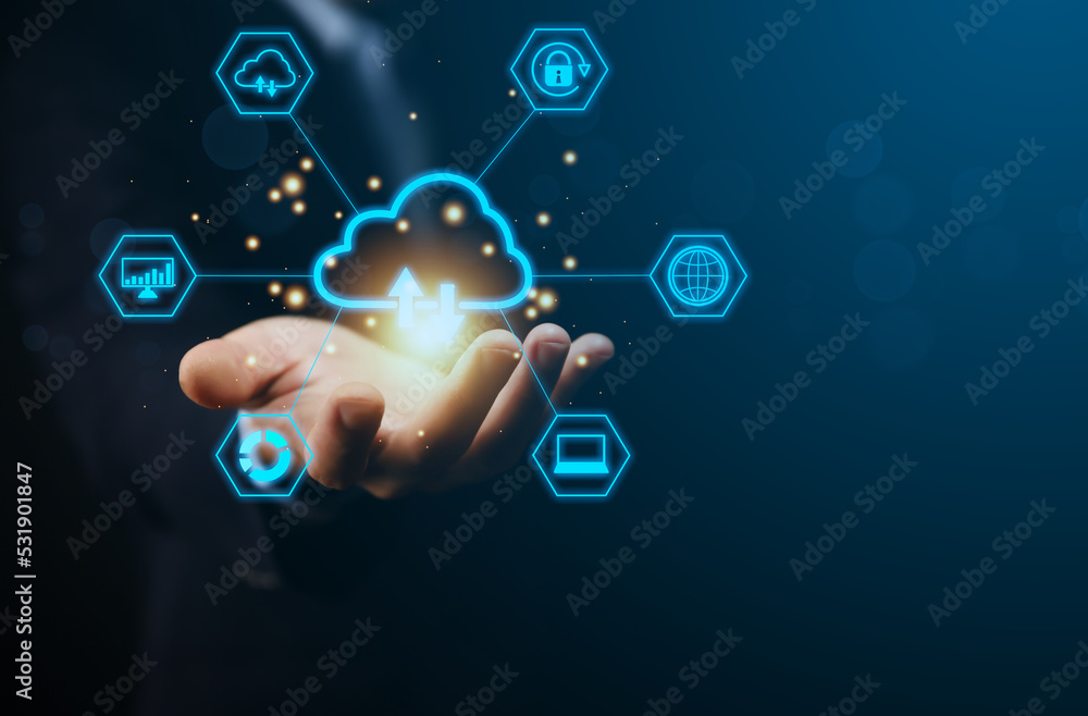 Businessman's hands showing a diagram of Cloud computing information technology icon. Businessman's hands showing a diagram of Cloud computing information technology icon.