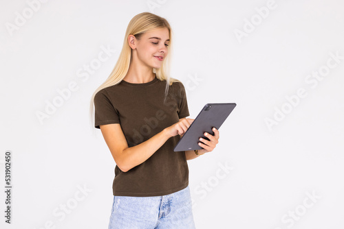 Happy Smiling woman with tablet pc isolated on white background