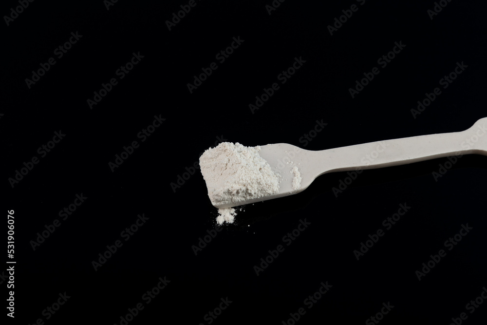 White chemical powder. Titanium dioxide, TiO2. Food additive E171