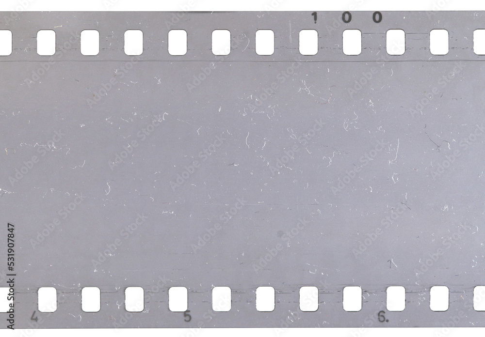 Strip of old celluloid film with dust and scratches on transparent background