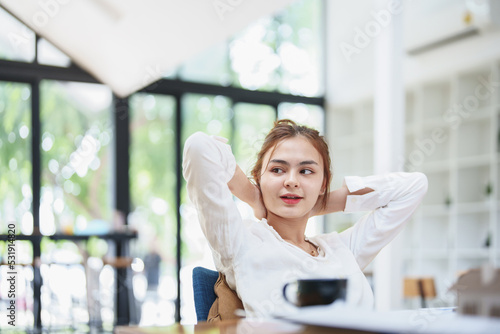 Free Download young employee showing a smile and a relaxed expression after work - GFXLoad