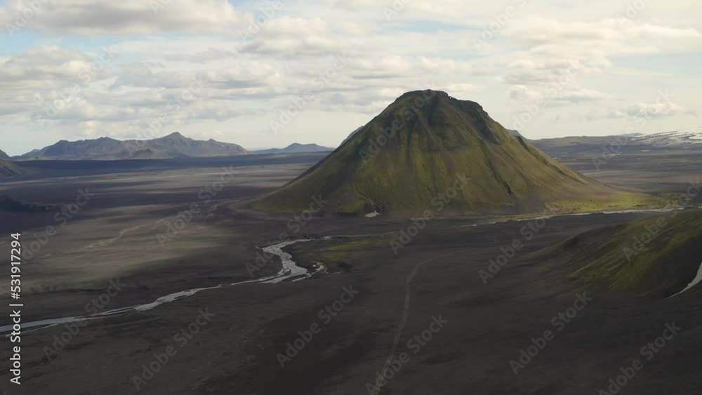 Aerial view showing river and Maelifell Mountain in nature of Iceland Aerial view showing river and Maelifell Mountain in nature of Iceland
