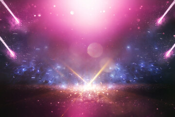 background of abstract blue, pink, purple and gold glitter lights. defocused