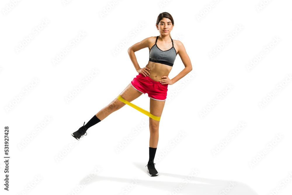 Beautiful young woman with a fitness lifestyle exercising in full length Beautiful young woman with a fitness lifestyle exercising in full length