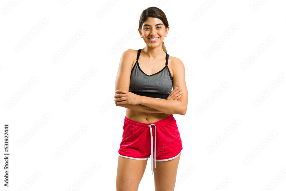 Happy young woman ready for her cross training workout Happy young woman ready for her cross training workout