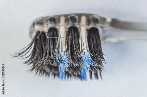 Close-up of an old toothbrush, brush bristles