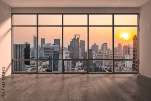 Empty room Interior Skyscrapers View Bangkok. Downtown City Skyline Buildings from High Rise Window. Beautiful Expensive Real Estate overlooking. Sunset. 3d rendering.