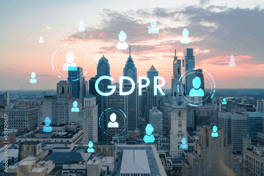 Aerial panoramic skyline of Philadelphia financial downtown, Pennsylvania, USA. City Hall Clock Tower at sunset. GDPR hologram, concept of data protection regulation and privacy for all individuals