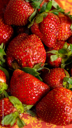 Strawberries background. Close up, selected focus. raw