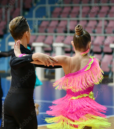 Girl and young man dancing