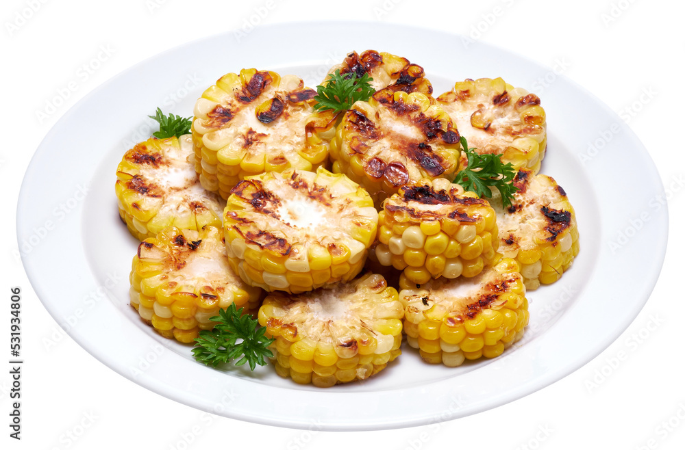 Grilled Slices of corn cobs with stripes from a grill in ceramic plate Grilled Slices of corn cobs with stripes from a grill in ceramic plate