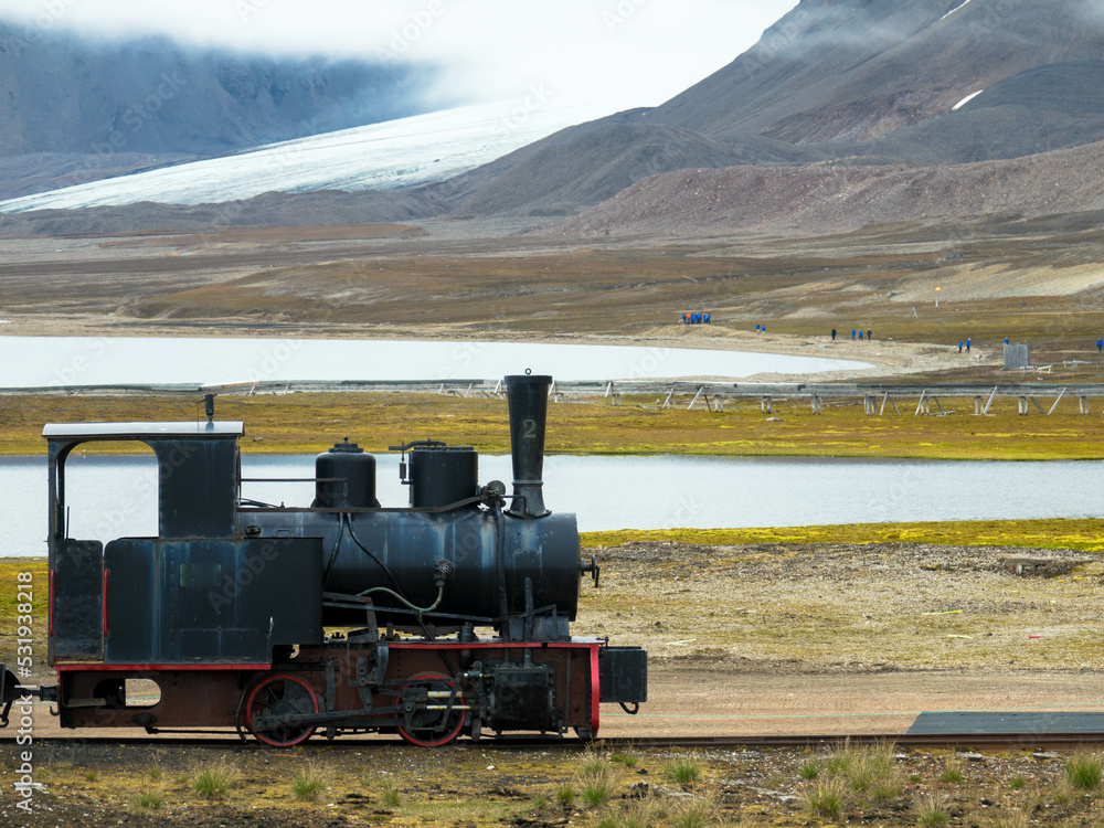 Obraz premium Old and derelict mining railway in Ny-Alesund, Spitsbergen, Kongsfjord, Svalbard, Norway