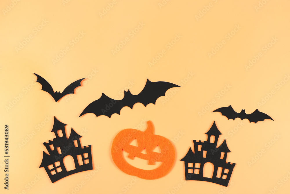 decorations for Halloween holiday, Halloween pumpkins, castles and bats on orange color background.