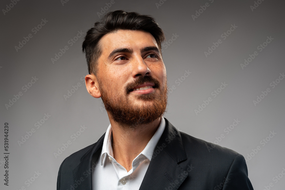 Portrait of handsome confident business on gray background Portrait of handsome confident business on gray background