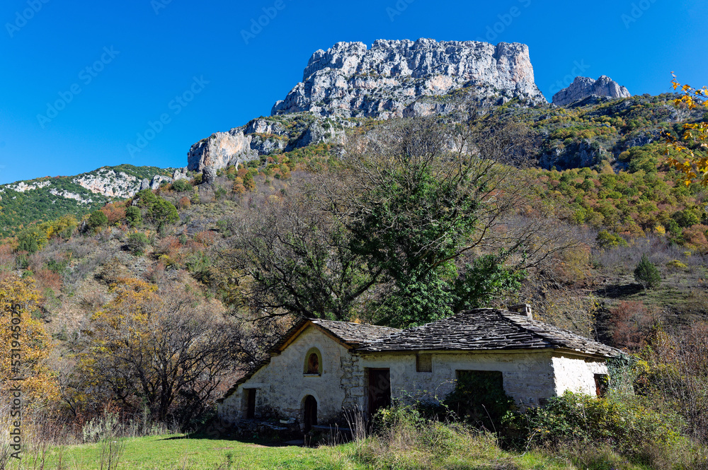 Old chapel at the springs of Voidomatis River at the Vikos Gorge, listed as the deepest gorge in the world by the Guinness Book of Records, in Epirus, Greece Old chapel at the springs of Voidomatis River at the Vikos Gorge, listed as the deepest gorge in the world by the Guinness Book of Records, in Epirus, Greece
