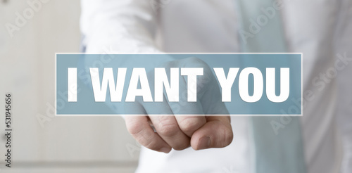 Foto businessman pointing a blue sign with the message I want you- Job concept