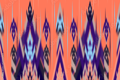 Ethnic ikat chevron pattern background Traditional pattern on the fabric in Indonesia and other Asian countries. 