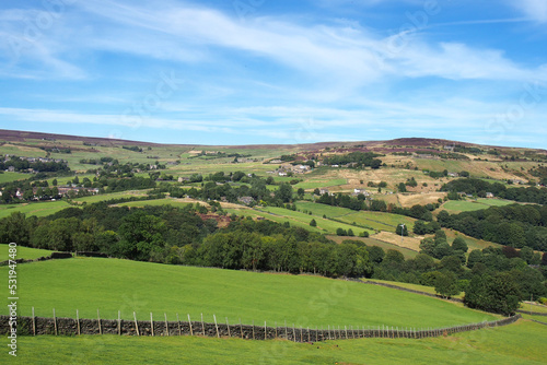 scenic image of the calder valley between hebden bridge and midgley in calderdale west yorkshire with villages and farmland on yorkshire dales hills photo