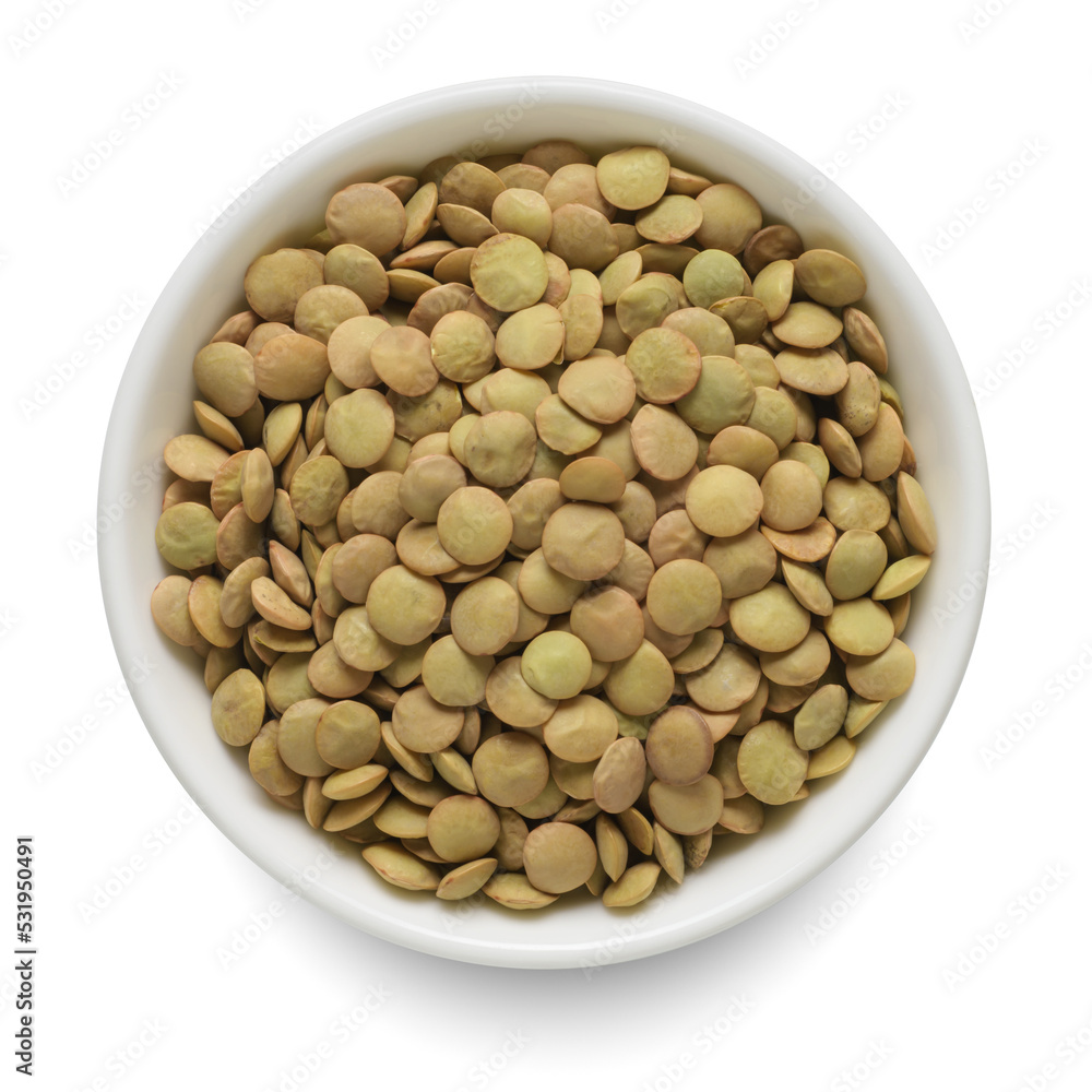 Green lentil in white bowl isolated on white. Top view. Green lentil in white bowl isolated on white. Top view.