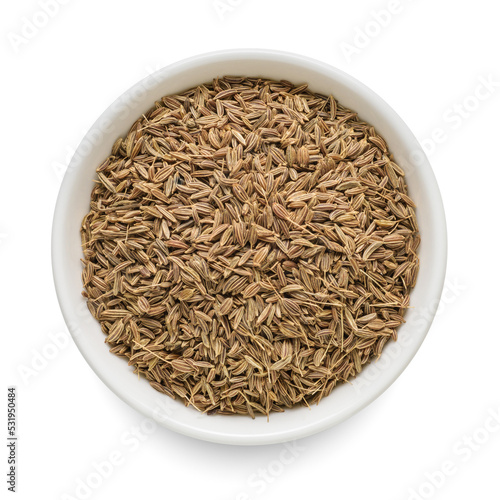 Caraway seed seasoning in white bowl isolated on white. Top view.