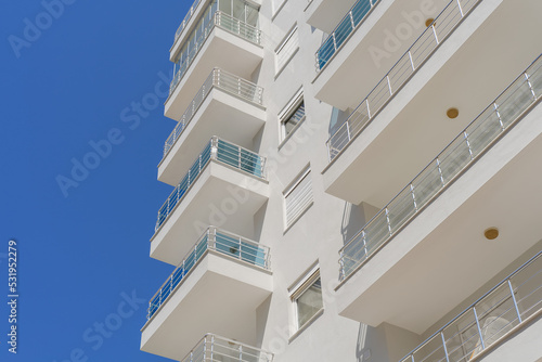 Residential apartment building. Blue sky.