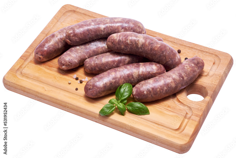 Raw beef or pork grill sausage on wooden cutting board isolated Raw beef or pork grill sausage on wooden cutting board isolated