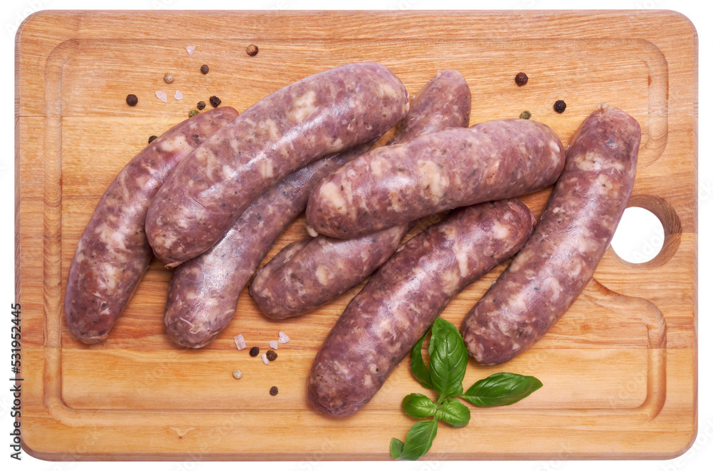 Raw beef or pork grill sausage on wooden cutting board isolated Raw beef or pork grill sausage on wooden cutting board isolated