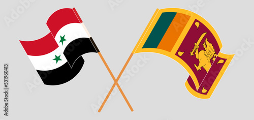 Crossed and waving flags of Syria and Sri Lanka