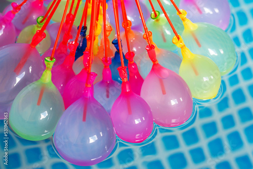 water balloon in the pool on the water