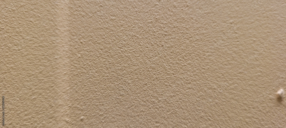 light brown background on wall panel light brown background on wall panel