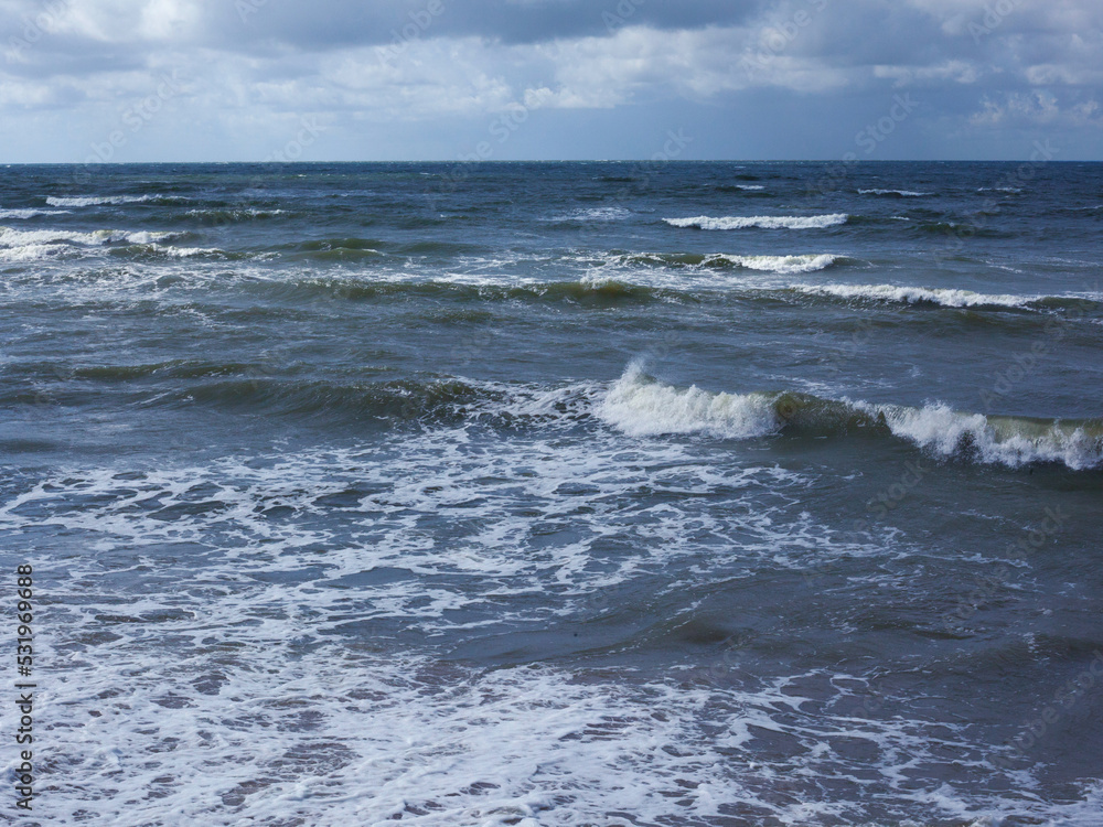 Summer sea view with stormy sea waves