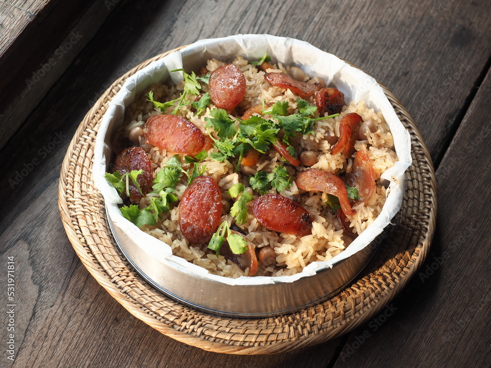 fried rice with roasted Chinese dried pork sausage, dried shrimp and peanut, topped with fresh coriander