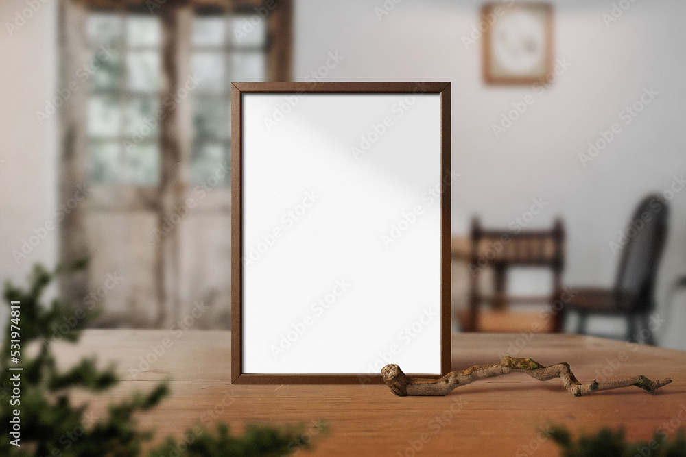 Clean minimal frame mockup standing on wooden top table with plants Clean minimal frame mockup standing on wooden top table with plants
