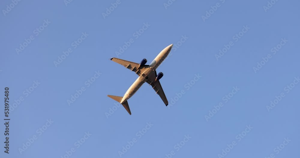 Plane is approaching overhead and arriving at airport Plane is approaching overhead and arriving at airport