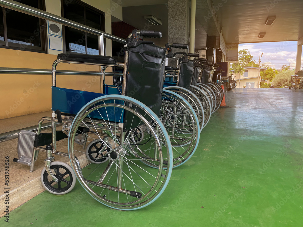 Fototapeta premium Hospital wheelchairs that serve patients who are unable to walk who come to the hospital for treatment. Soft and selective focus.