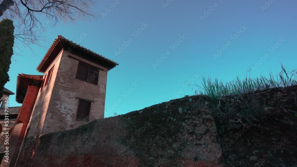 GRANADA, SPAIN - March 2022 : Alhambra fortress in Granada, Spain GRANADA, SPAIN - March 2022 : Alhambra fortress in Granada, Spain